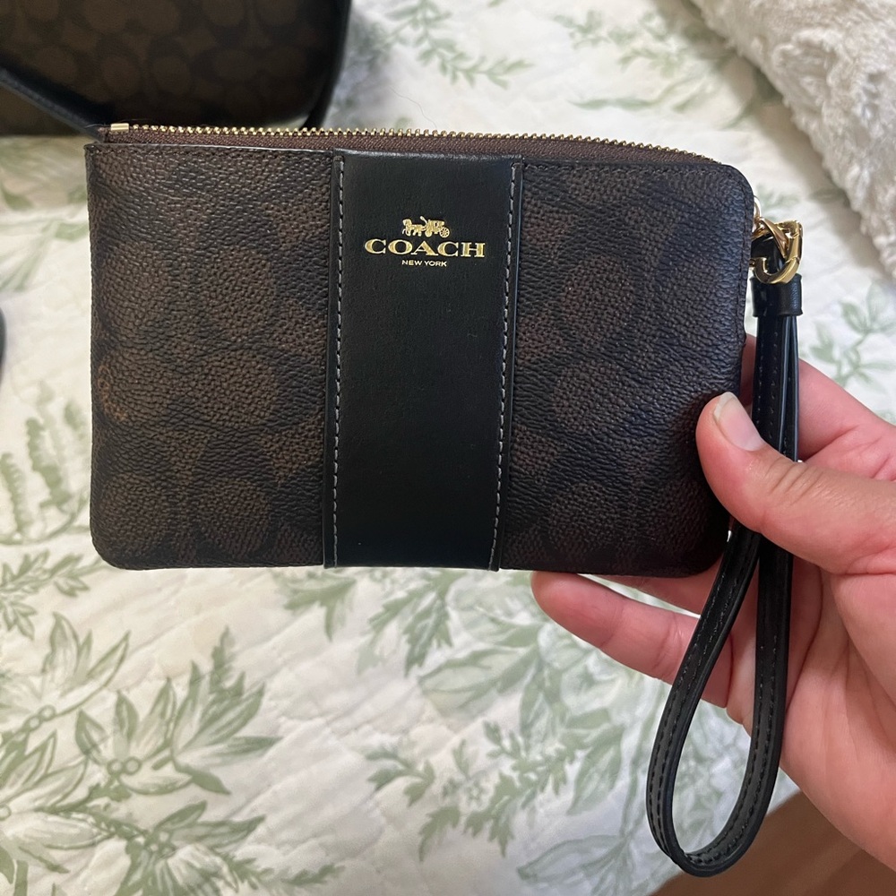 Coach Corner Zip Wristlet In Signature Canvas With Stripe